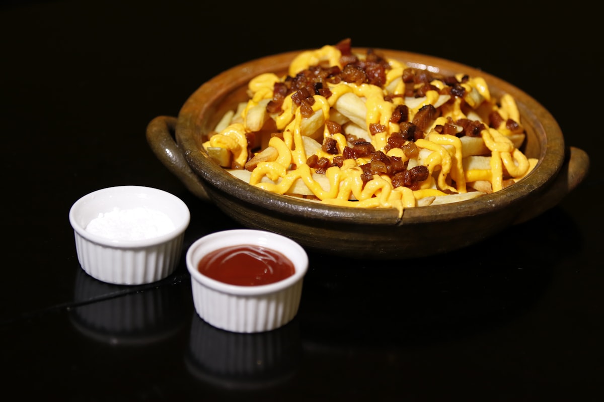 brown and white ceramic bowl with food